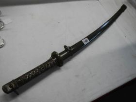 An Japanese NCO Katana sword in scabbard. In good condition, COLLECT ONLY.
