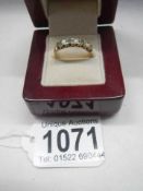 A seven stone 9ct gold hallmarked ring.