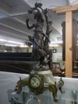 A good French mantel clock surmounted female figure, in good working order. COLLECT ONLY.