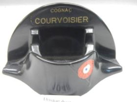 A bakelite Corvoisier cognac pen stand.