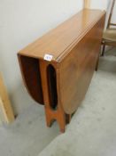 A teak drop side table, COLLECT ONLY.