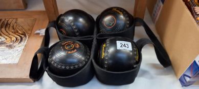A set of 4 Kenselite classic medium 3 H24-5a lawn bowls