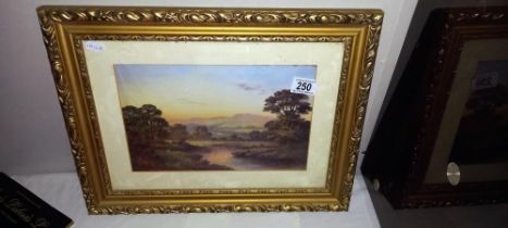 A vintage gilt framed print of country side