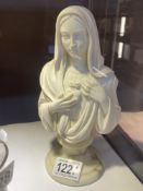 A signed Italian head and shoulders bust of the Virgin Mary on a marble base