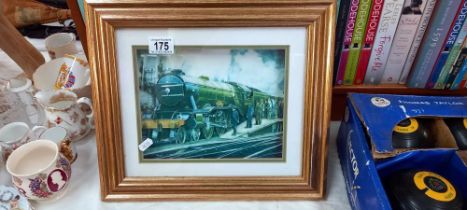 A gilt framed 3D picture of a steam train