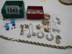 A good mixed lot of costume jewellery including earrings.