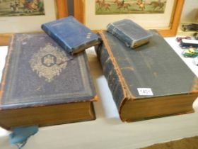 Two early family bibles, one with coloured plates, the other with black & white plates and two