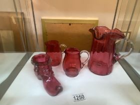 4 items of cranberry glass