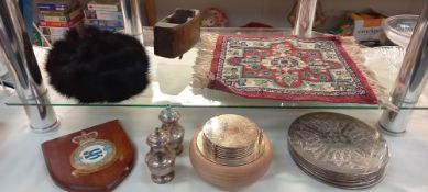 A mixed lot including RAF shield, fur hat, vintage carpet prayer mat etc