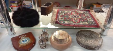 A mixed lot including RAF shield, fur hat, vintage carpet prayer mat etc