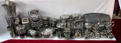 A large lot of stainless steel kitchen ware