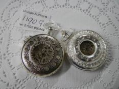 Two modern pocket watches.