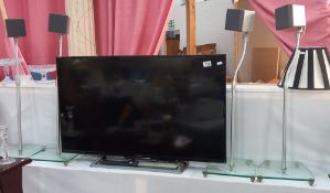 A Sony TV and 4 Sony speakers COLLECT ONLY