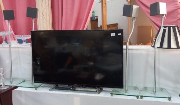 A Sony TV and 4 Sony speakers COLLECT ONLY