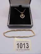 A 9ct gold heart pendant and a 9ct gold bracelet, 10.83 grams.