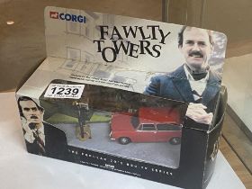 A boxed Corgi Fawlty Towers Austin 1300 estate and Basil Fawlty set no 00802