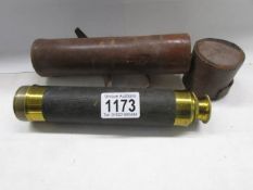 A leather cased four draw brass telescope.