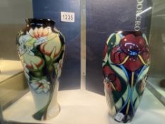 2 boxed Moorcroft vases, one first, one with red dot