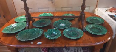 A quantity of vintage green ceramic plates