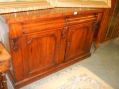 A mahogany 2 door, 2 drawer sideboard. COLLECT ONLY.