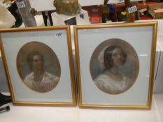 A pair of framed and glazed portraits in watercolour.