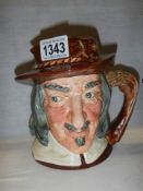 A Royal Doulton character jug.