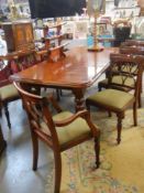 A mahogany dining table and eight chairs, COLLECT ONLY.