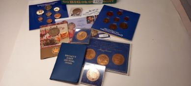 A quantity of commemorative crown/coin sets including Charles and Camilla marriage etc