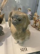 A Lladro Pekinese dog