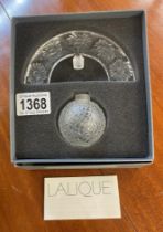 A boxed Lalique Folie Perfume bottle with an Arc Tiara stopper