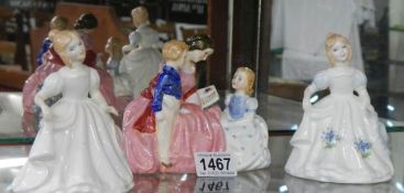 Three Royal Doulton figurines,
