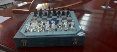 A cased Prestige Crystal chess set with board COLLECT ONLY
