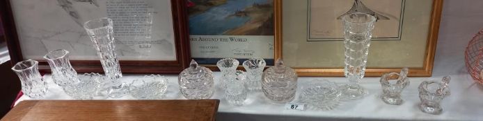 A good lot of glass posy holders, vases, penny licks etc