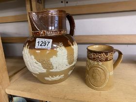 A Doulton Lambeth1837 Queen Victoria stoneware Jasperware jug and a coronation mug 1837-1897