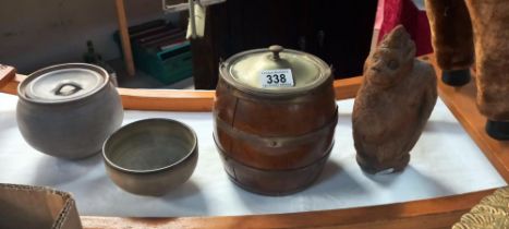 A vintage biscuit barrel, 2 pottery items and a vintage carved coconut gorilla