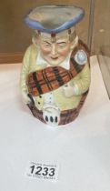A rare antique Scottish man Toby jug