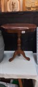 A dark wood stained tripod side table with inlay top COLLECT ONLY