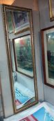 A gilt framed bevel edged long mirror COLLECT ONLY