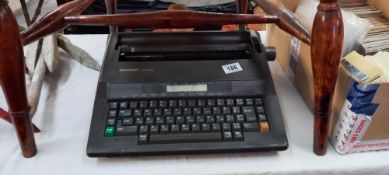 A vintage Sharp PA-3030 electric typewriter