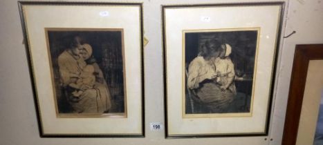 A pair of framed black and white prints
