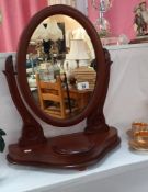 An oval Victorian mahogany toilet mirror, COLLECT ONLY