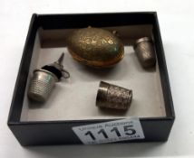 A Victorian egg shaped thimble holder off a chatelaine and 2 Charles Horton silver thimbles, plus