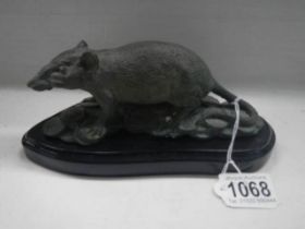 A 20th century bronze rat paperweight.