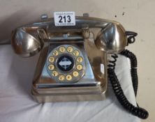 A retro styled chromed lobby phone/telephone
