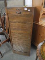 An oak tambor front filing cabinet. COLLECT ONLY.