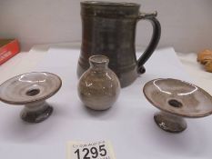 Three small pieces of David Leach pottery and a pottery tankard.