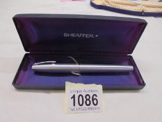 A boxed Shaeffer fountain pen.