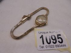 A 9ct gold ladies wrist watch, total weight 15.85 grams.
