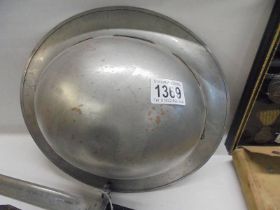 A WW2 metal helmet.