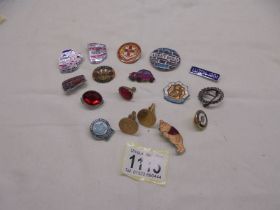 A tin of pin badges including 1920 Lincoln mechanical engineers, Beatles Abbey Road etc.,